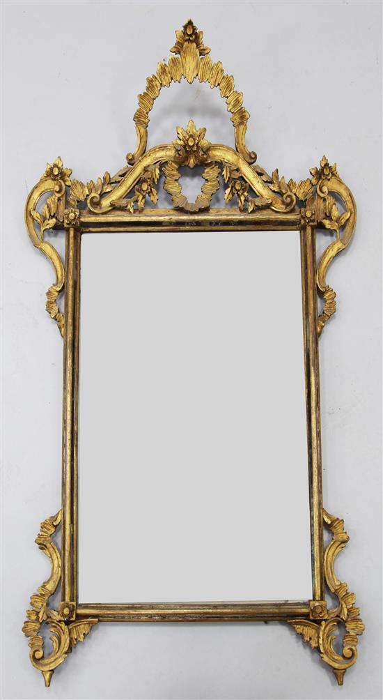 A 19th century Continental giltwood wall mirror, W.2ft 11in. H.5ft